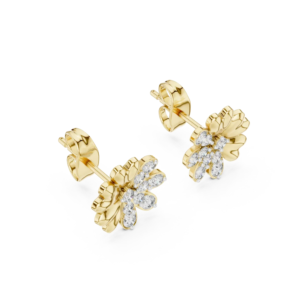 Discover the radiant brilliance of these cluster stud earrings, featuring sparkling DIAMEUR diamonds. Elevate your style and shop the collection now.