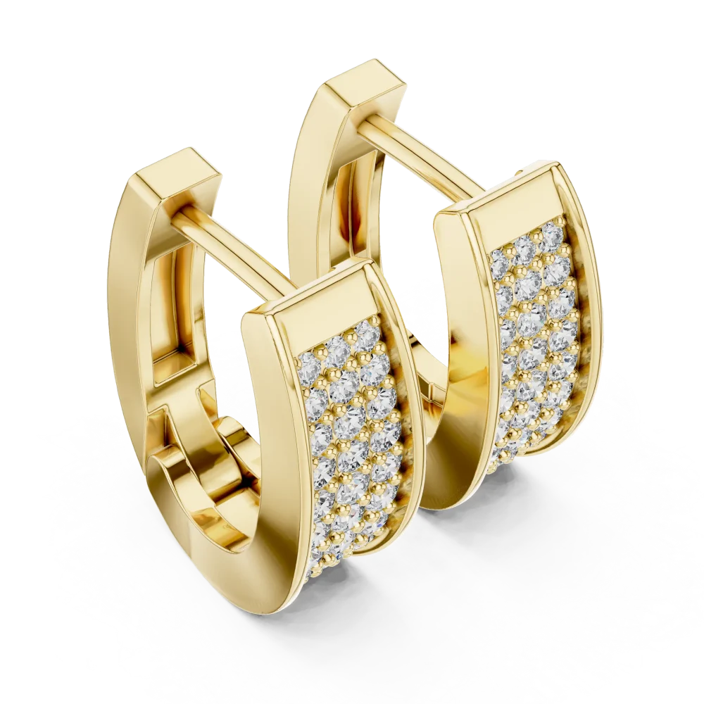 Experience radiant elegance with these pavé-set hoop earrings. Featuring brilliant-cut DIAMEUR diamonds, these modern classics are made for you. Shop now.