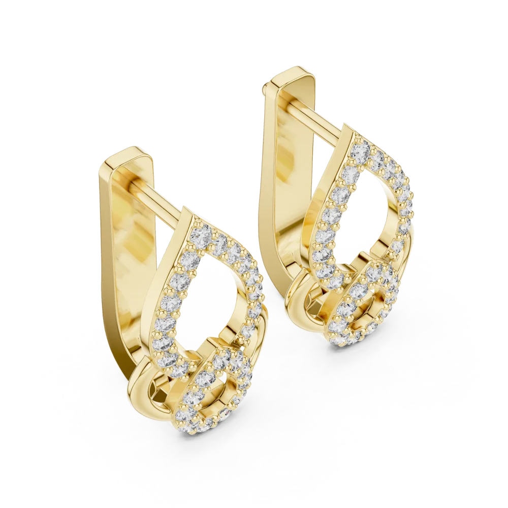 Discover the radiant brilliance of these pavé-set round DIAMEUR diamond earrings. A modern geometric essential designed to elevate your style. Shop now.