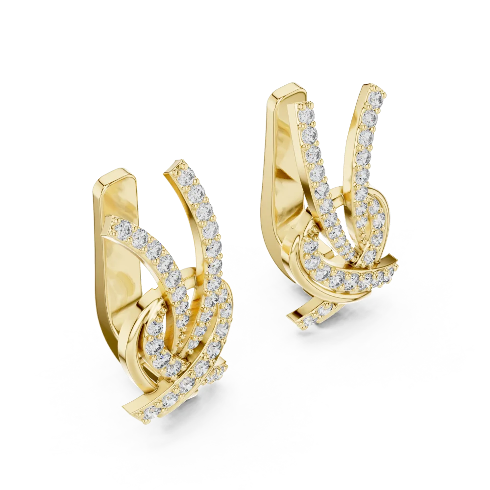 Adorn your ears with the radiant fire of these architectural pavé-set lab-grown diamond stud earrings. Shop our sustainable luxury collection.