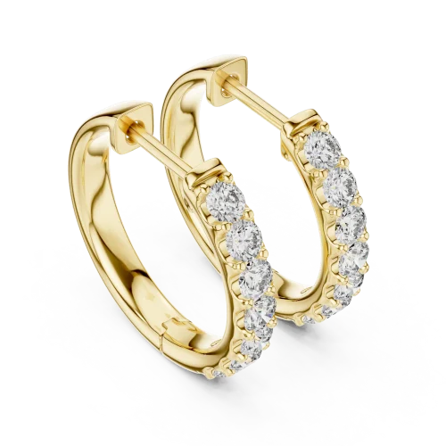 Luminary gold hoop earrings featuring a pavé-set row of brilliant-cut DIAMEUR diamonds for exceptional sparkle.
