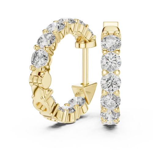 Sparkling round lab-grown diamond huggie hoop earrings set in polished gold, featuring a secure hinge closure.