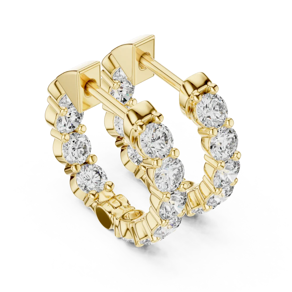 Discover the radiant brilliance of our pavé-set DIAMEUR diamond hoop earrings. A modern classic designed for effortless elegance. Shop the collection.