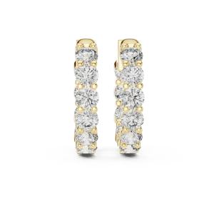 Sparkling round lab-grown diamond huggie hoop earrings featuring a brilliant row of stones set in polished gold.