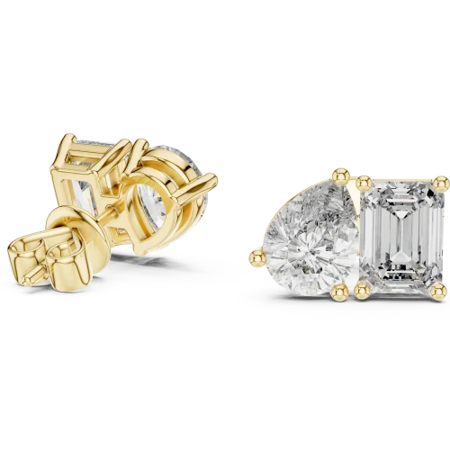 Two stone lab grown diamond stud earrings featuring a pear cut and emerald cut diamond set in polished gold.