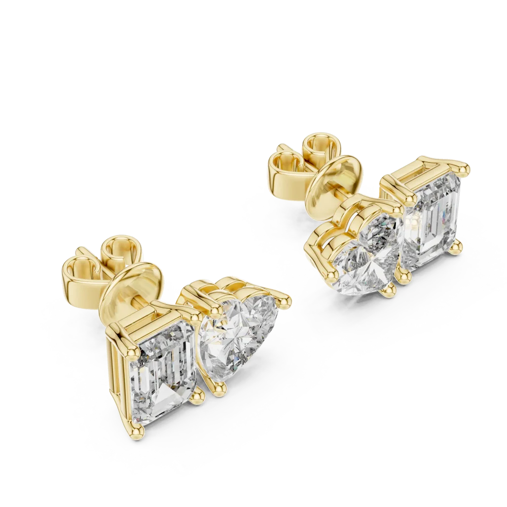 Duo lab-grown diamond stud earrings featuring a heart-shaped and emerald-cut stone set in polished gold.