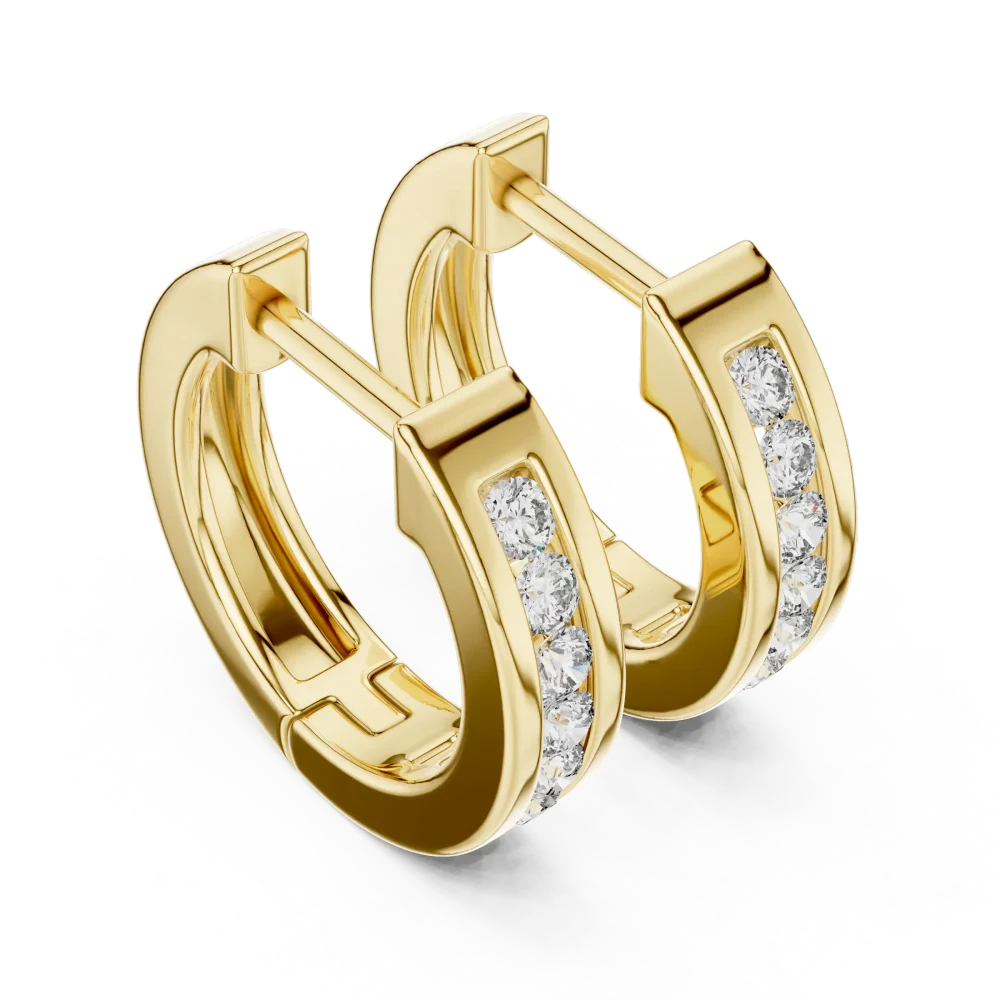 Discover the radiant brilliance of our channel-set hoop earrings, featuring premium DIAMEUR diamonds. Elevate your style with timeless luxury today.