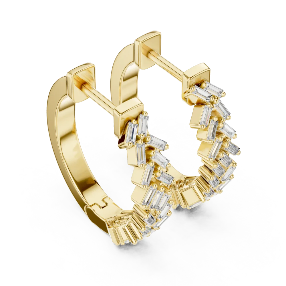 Discover the radiant allure of our Baguette Chevron Hoops. Set with premium DIAMEUR diamonds, these modern classics offer unmatched sparkle. Shop now.