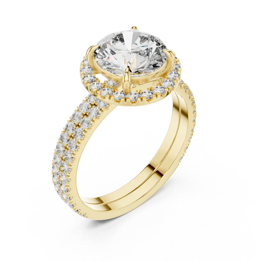 Discover the radiant beauty of this round solitaire ring, featuring a brilliant DIAMEUR diamond set in a pavé halo. Shop this modern classic today.