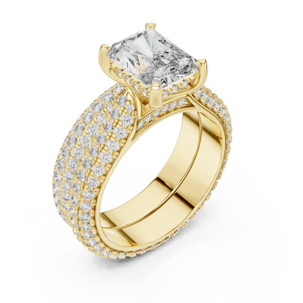 Experience the brilliant allure of our radiant cut solitaire ring, featuring pavé-set DIAMEUR diamonds. Elevate your collection with this icon. Shop now.