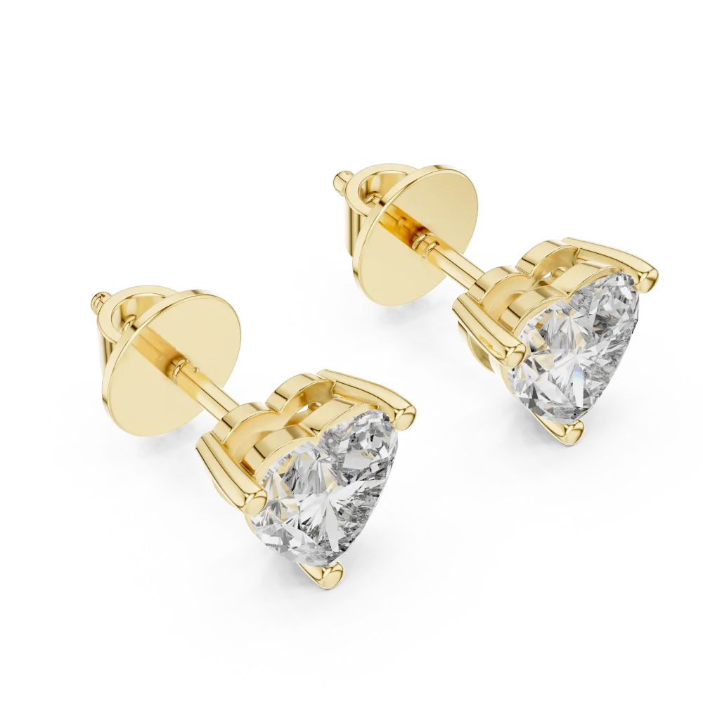 Ethereal Heart Solitaire Stud Earrings featuring brilliant heart-cut DIAMEUR diamonds set in polished gold.