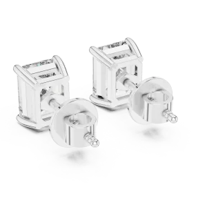 Architectural Emerald Cut Solitaire Stud Earrings featuring geometric silver settings and DIAMEUR diamonds on white surfaces.