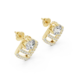 Luminary gold stud earrings featuring a central round brilliant diamond surrounded by geometric chevron pavé detailing.