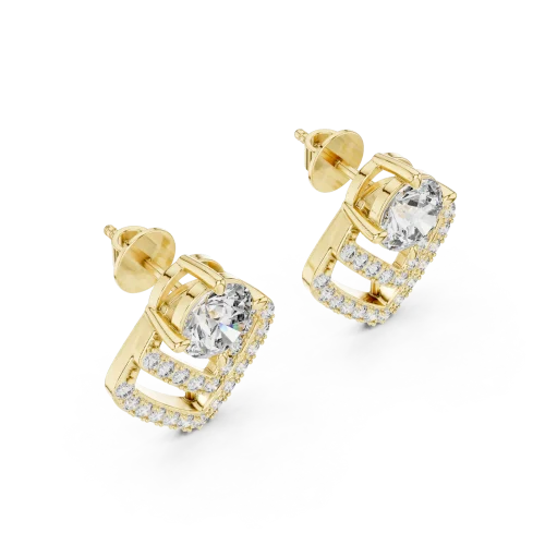 Luminary gold stud earrings featuring a central round brilliant diamond surrounded by geometric chevron pavé detailing.