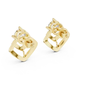 Luminary Round Brilliant Chevron Pavé solitaire stud earrings in gold with a geometric silhouette and central diamonds.