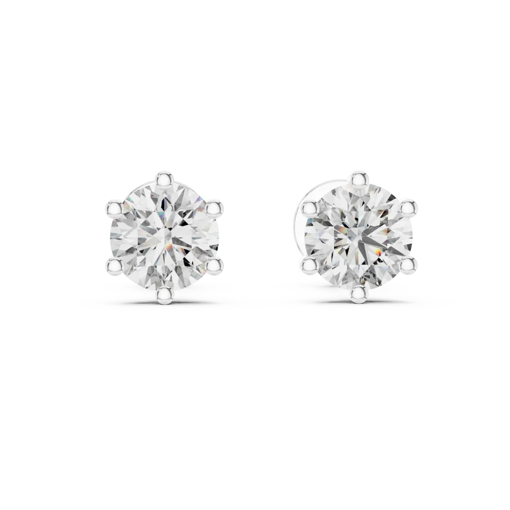 Luminary round brilliant solitaire stud earrings with secure six-prong settings and sparkling diamond facets.