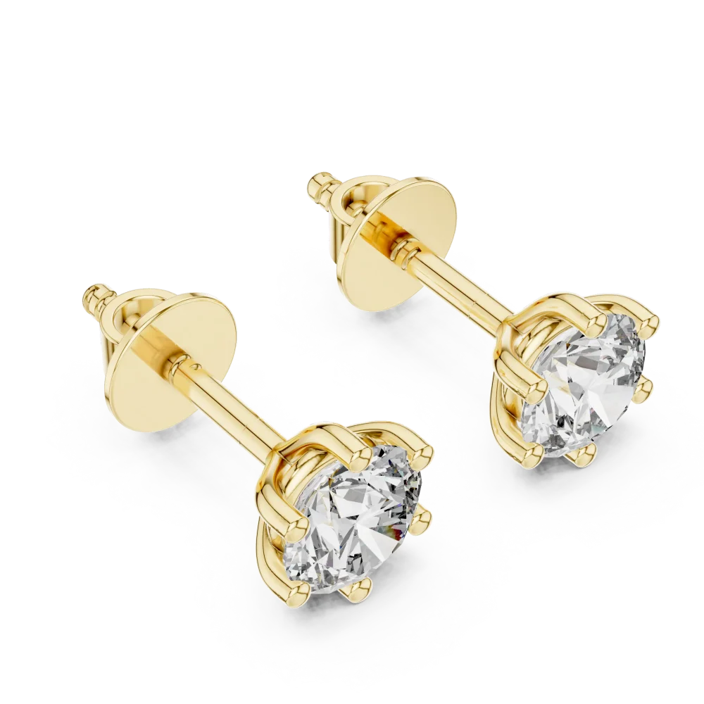 Luminary round brilliant solitaire stud earrings in gold with a secure six-prong setting and sparkling diamond centers.