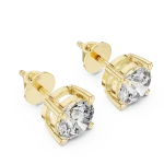 Classic round solitaire diamond stud earrings in yellow gold with a secure four-prong setting for maximum sparkle.