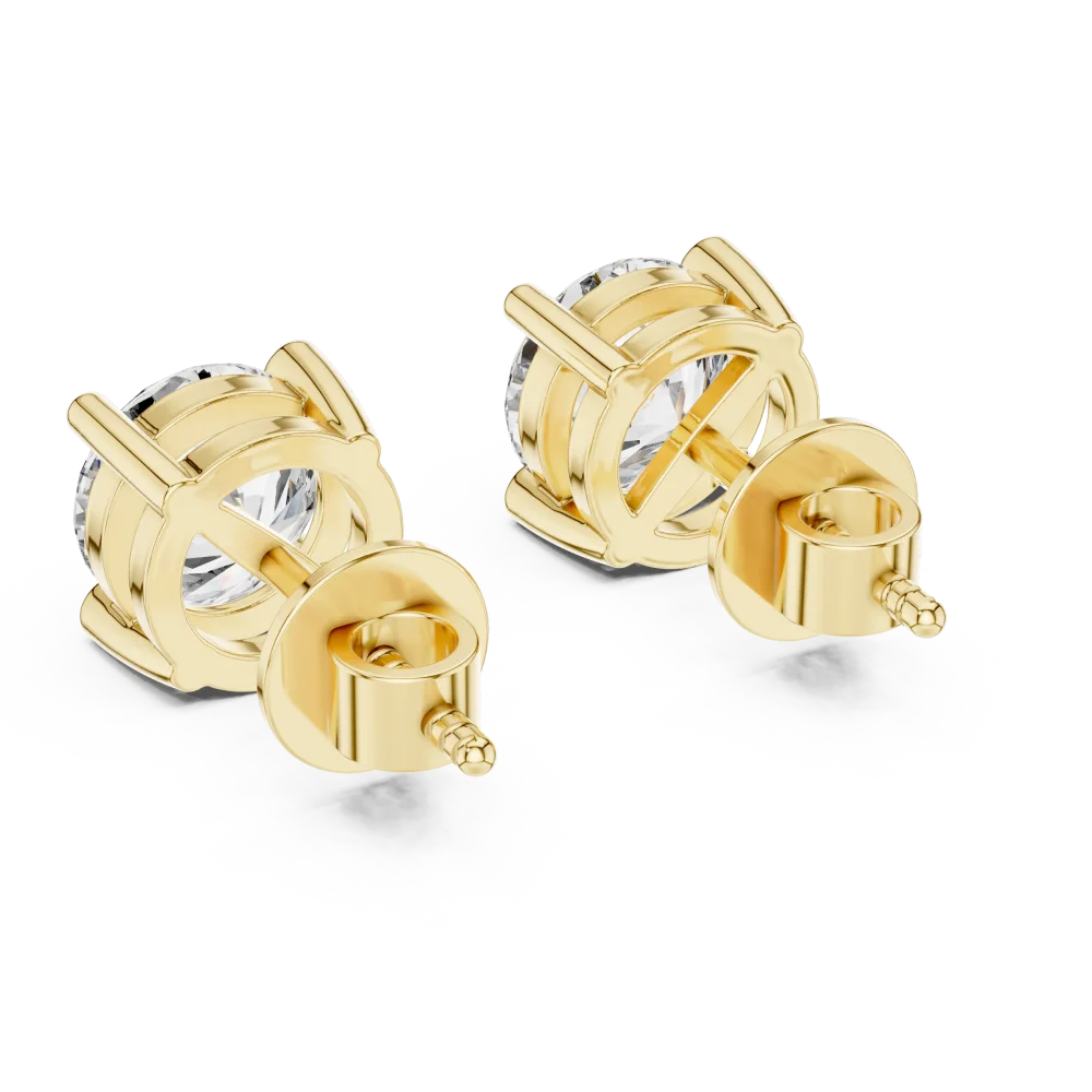Classic round solitaire diamond stud earrings in yellow gold with a secure four-prong setting for maximum sparkle.