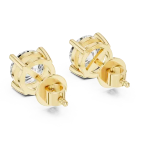 Classic round solitaire diamond stud earrings in yellow gold with a secure four-prong setting for maximum sparkle.