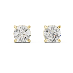 Classic round solitaire diamond stud earrings set in four-prong gold mounts for maximum sparkle and light reflection.