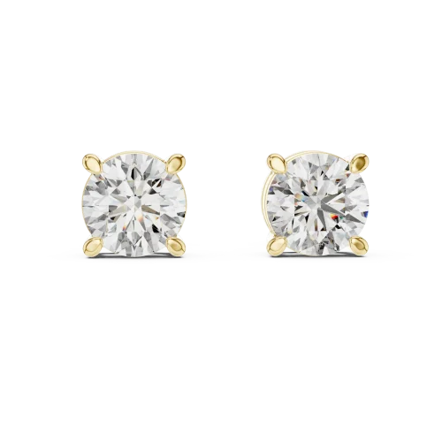 Classic round solitaire diamond stud earrings set in four-prong gold mounts for maximum sparkle and light reflection.