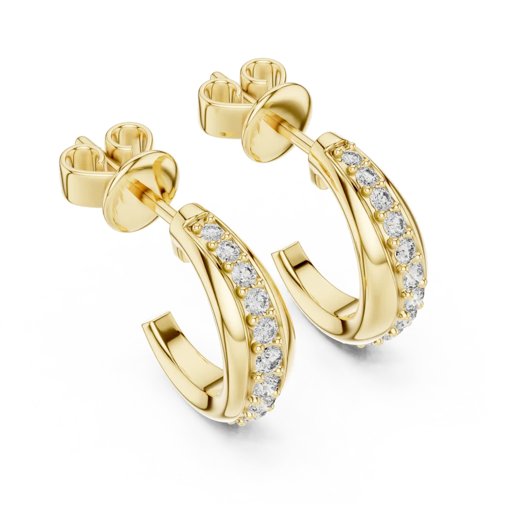 Discover the brilliance of our Luminary hoop earrings, featuring expertly set DIAMEUR lab-grown diamonds. A modern classic for your collection.