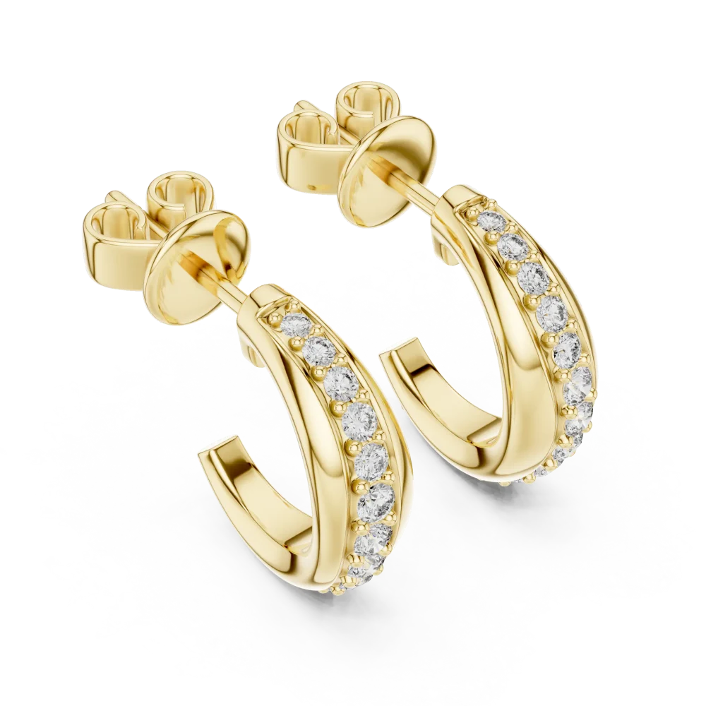 Adorn yourself with these elegant hoop earrings, featuring brilliant-cut DIAMEUR diamonds in a seamless pavé setting. A timeless modern classic.