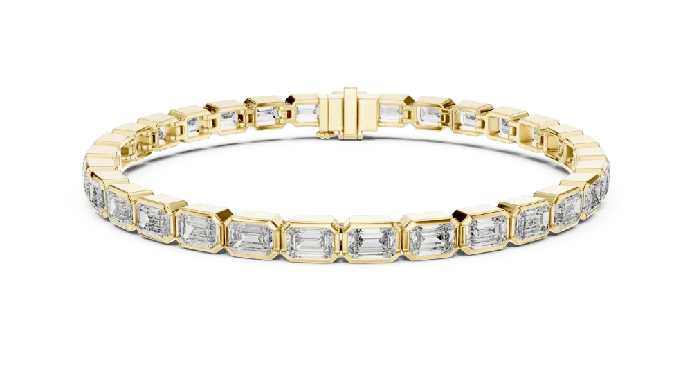 Discover the radiant elegance of our emerald cut tennis bracelet. Featuring premium DIAMEUR diamonds, this modern classic is crafted for you.