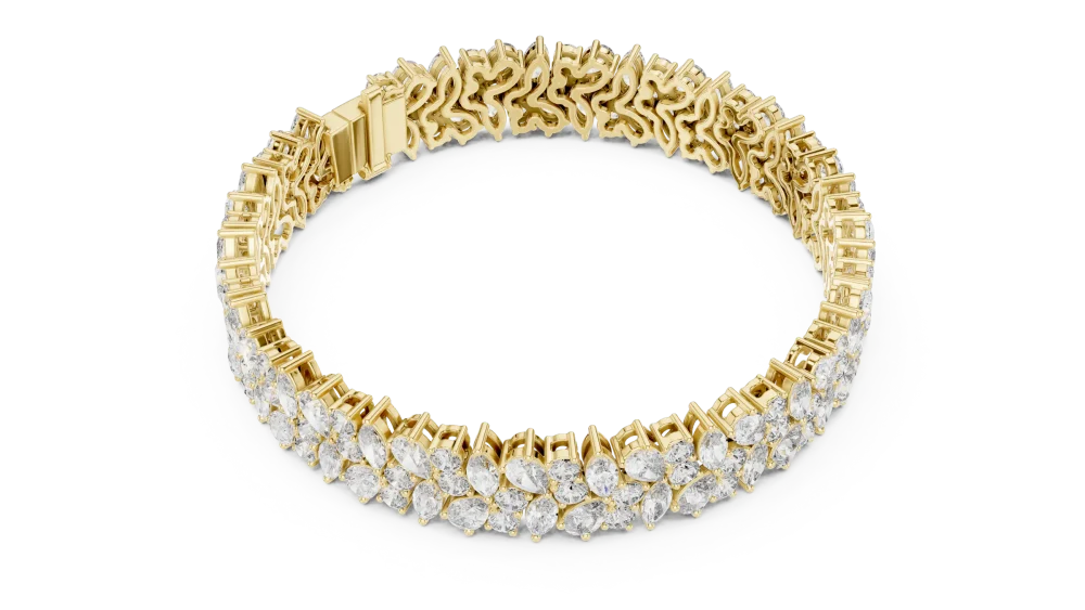 Adorn your wrist with the radiant sparkle of our multi-shape DIAMEUR diamond tennis bracelet. Experience modern luxury and timeless, elegant style.