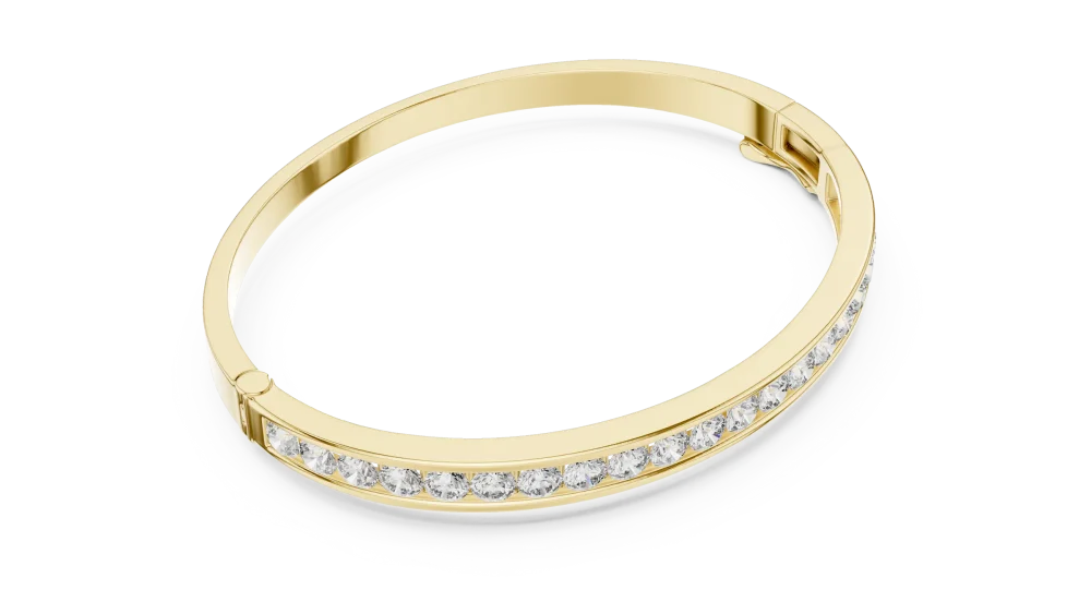 Discover the radiant allure of our channel-set bangle featuring premium DIAMEUR diamonds. Elevate your jewelry collection with this modern classic. Shop now.