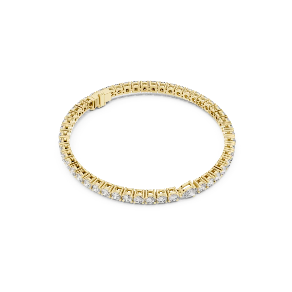 Adorn your wrist with this radiant tennis bracelet featuring brilliant-cut DIAMEUR diamonds and a unique pear-cut accent. Shop this sustainable luxury.
