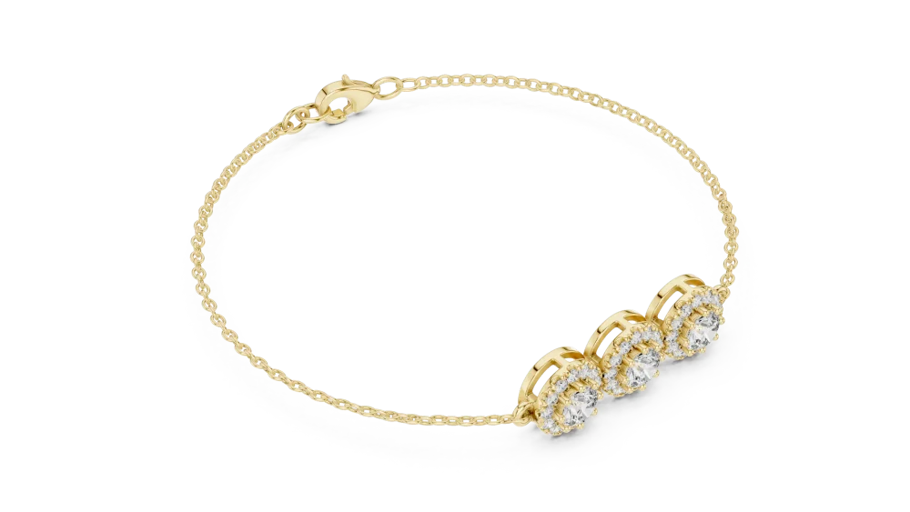 Embrace brilliance with our three-stone round DIAMEUR diamond halo bracelet. Handcrafted for modern luxury, shop this sustainable classic piece today.