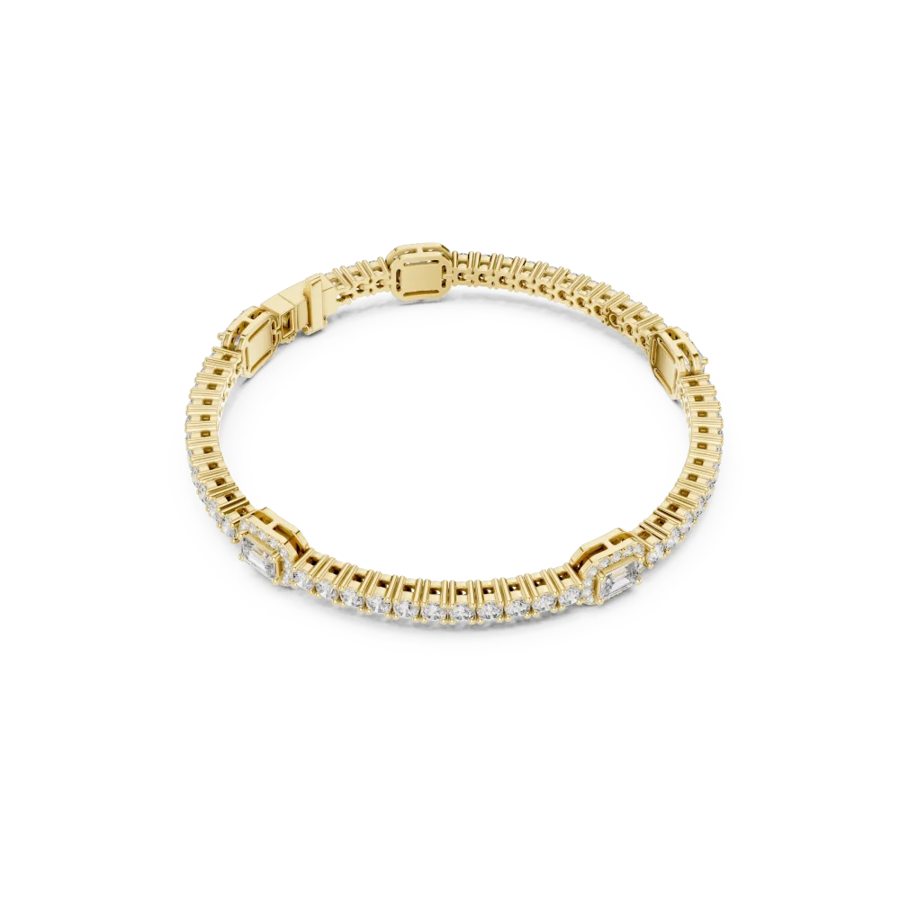 Discover the radiant allure of our emerald and round DIAMEUR diamond tennis bracelet. Elevate your style with this modern masterpiece of brilliance.