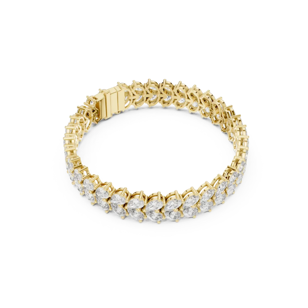 Adorn your wrist with this radiant lab-grown diamond tennis bracelet. Featuring pear-cut DIAMEUR stones, this piece is pure elegance. Shop now.