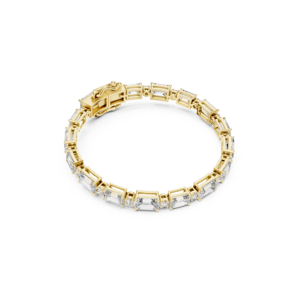 Experience the brilliance of this emerald and round-cut DIAMEUR diamond tennis bracelet. A modern classic for your collection. Shop the luxury today.
