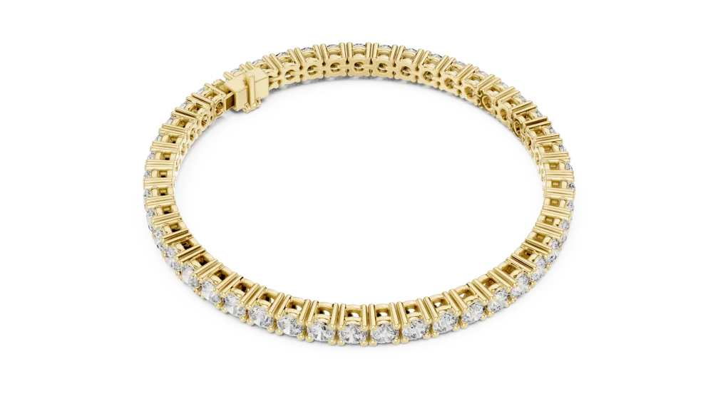 Discover the radiant brilliance of our round-cut tennis bracelet, featuring high-quality DIAMEUR diamonds. Shop this modern classic luxury today.