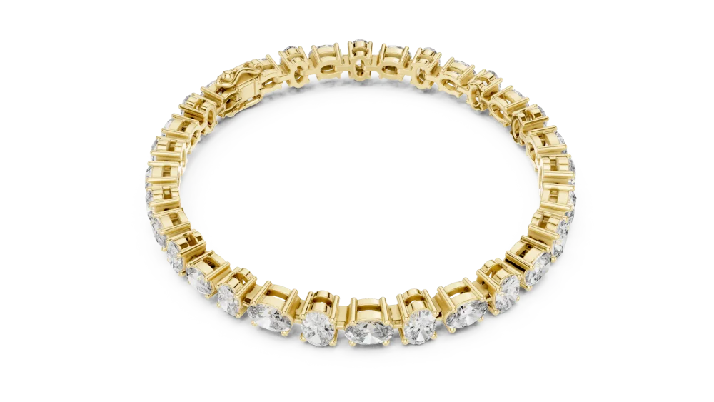 Discover the radiant allure of our oval-cut DIAMEUR lab-grown diamond tennis bracelet. Expertly handcrafted for timeless elegance. Shop the look now.