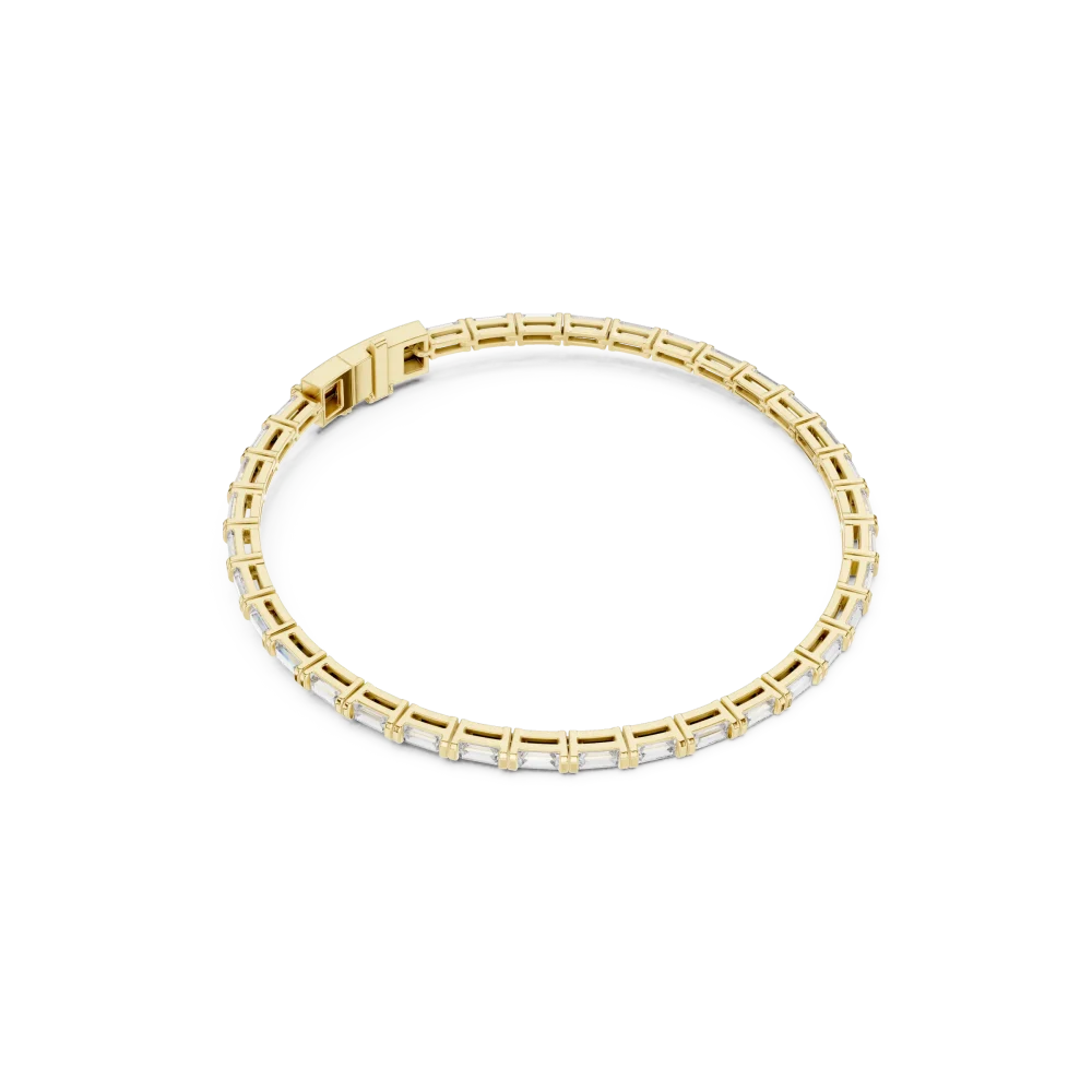 Discover the radiant allure of our baguette-cut DIAMEUR diamond tennis bracelet. A modern, architectural classic designed to elevate your collection.