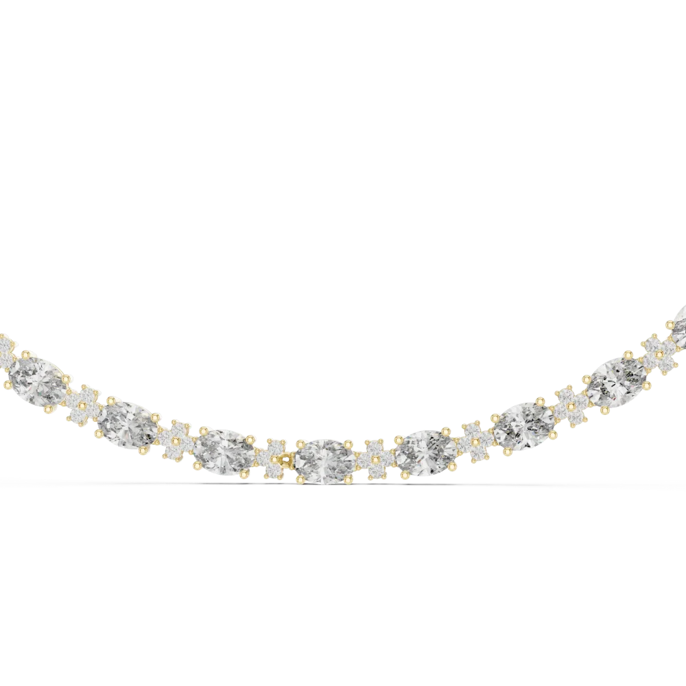 Discover the radiant elegance of our oval and round cluster tennis necklace. Crafted for brilliance, this modern classic piece redefines luxury. Shop now.