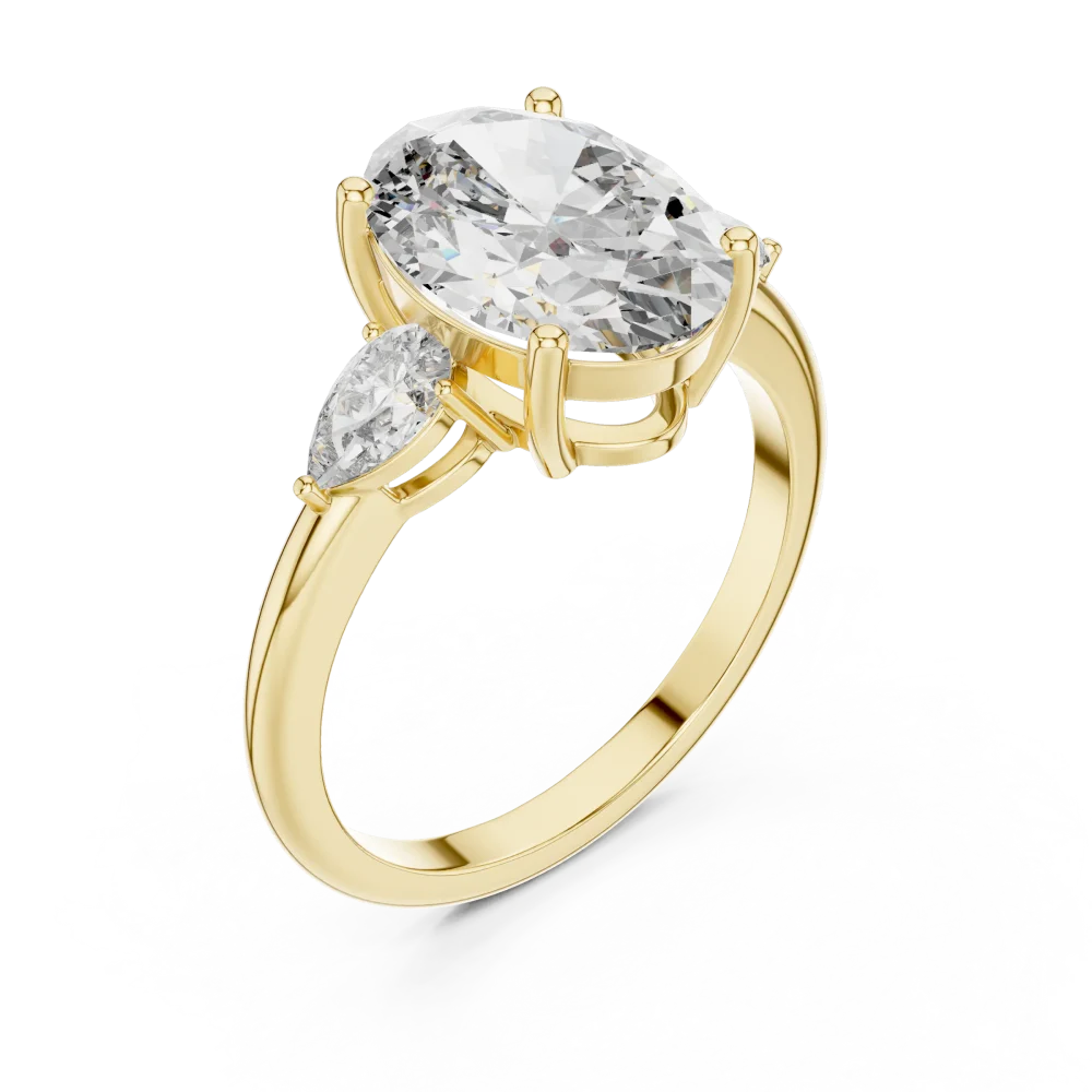 Experience unmatched brilliance with this Three-Stone Oval and Pear DIAMEUR diamond ring. A modern classic for your collection. Shop this luxury today.
