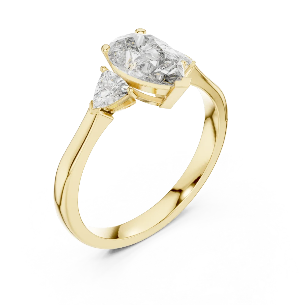 Discover the radiant brilliance of our three-stone pear and trillion ring. Expertly handcrafted for timeless elegance. Shop this sustainable beauty.