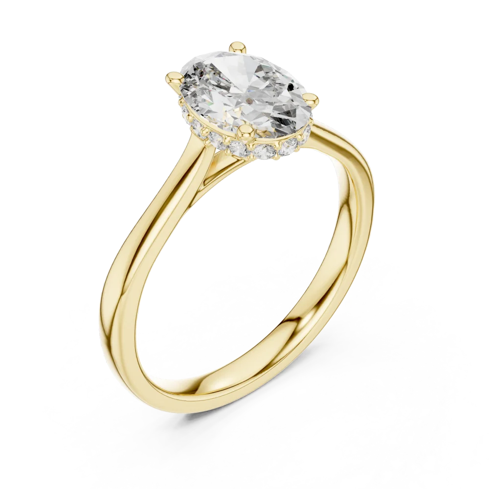 Discover the brilliance of our oval-cut solitaire ring, featuring a hidden halo of DIAMEUR diamonds for timeless luxury. Shop this modern classic today.