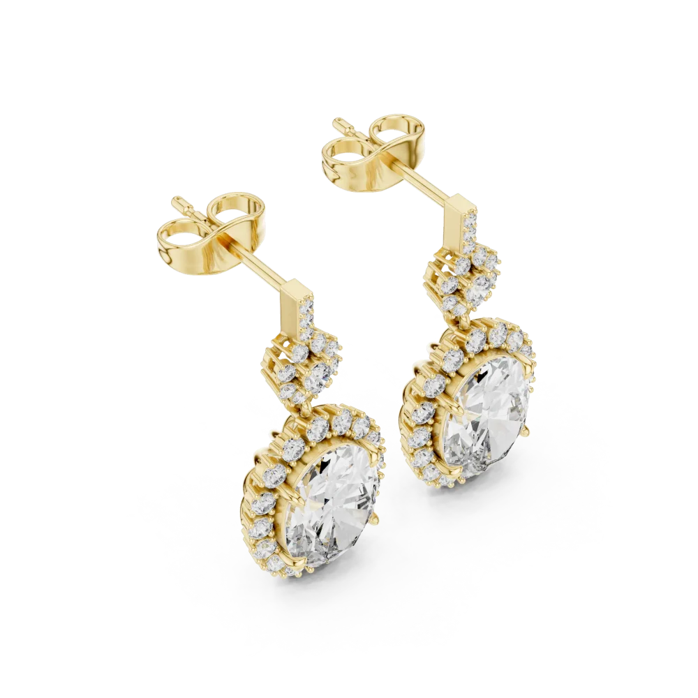 Discover the radiant beauty of these oval and round DIAMEUR diamond drop earrings. A modern classic designed to dazzle. Shop the collection now.