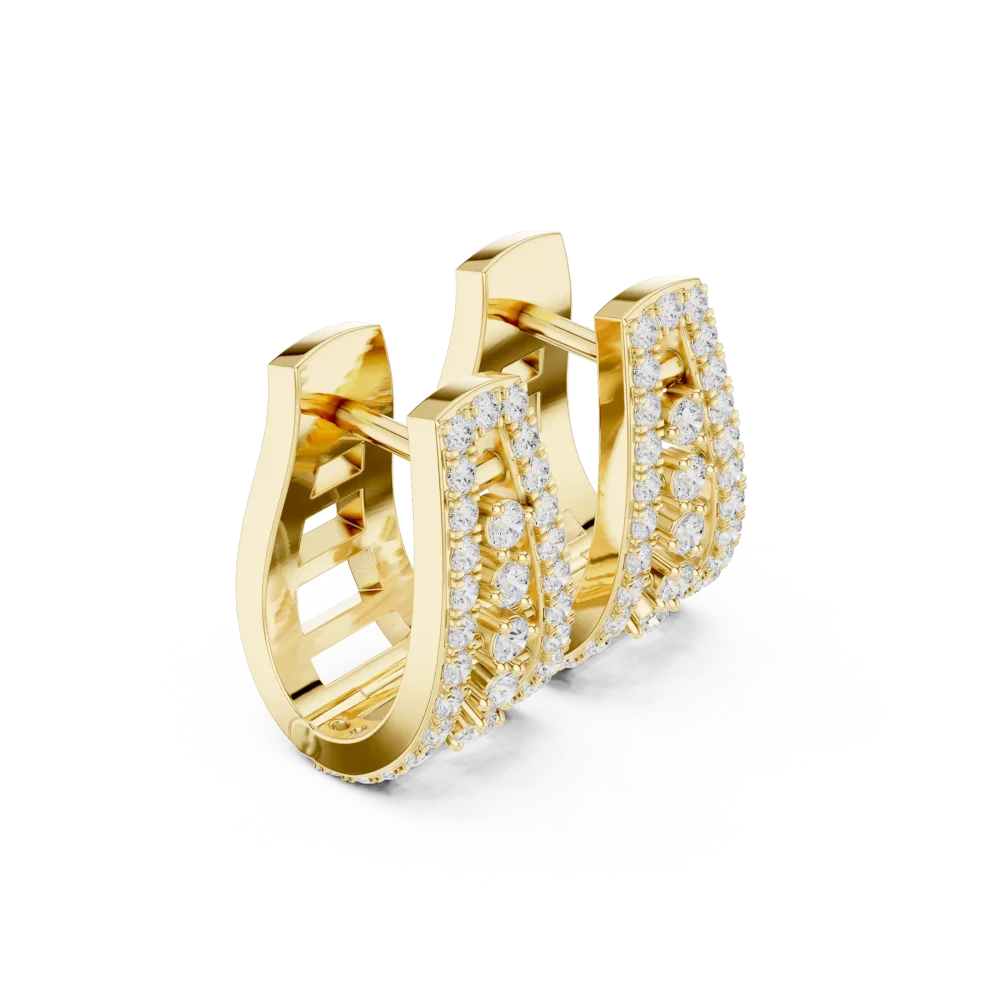 Experience modern brilliance with our architectural hoop earrings, featuring premium DIAMEUR diamonds. Discover sustainable luxury today.
