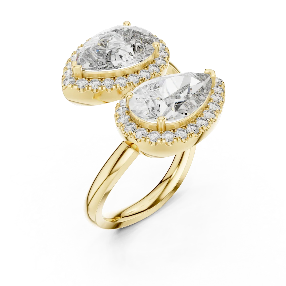 Discover the radiant beauty of this pear and pavé bypass ring. Featuring exquisite DIAMEUR lab-grown diamonds, add this modern classic to your collection.