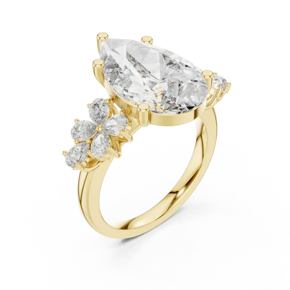 Discover the Ethereal Pear Cut Solitaire Ring, a floral-inspired design showcasing a brilliant DIAMEUR diamond. Elevate your style and shop today.
