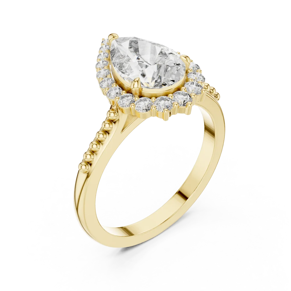 Experience timeless elegance with our Pear Luminary Halo Solitaire Ring. Featuring premium lab-grown diamonds, discover sustainable luxury today.