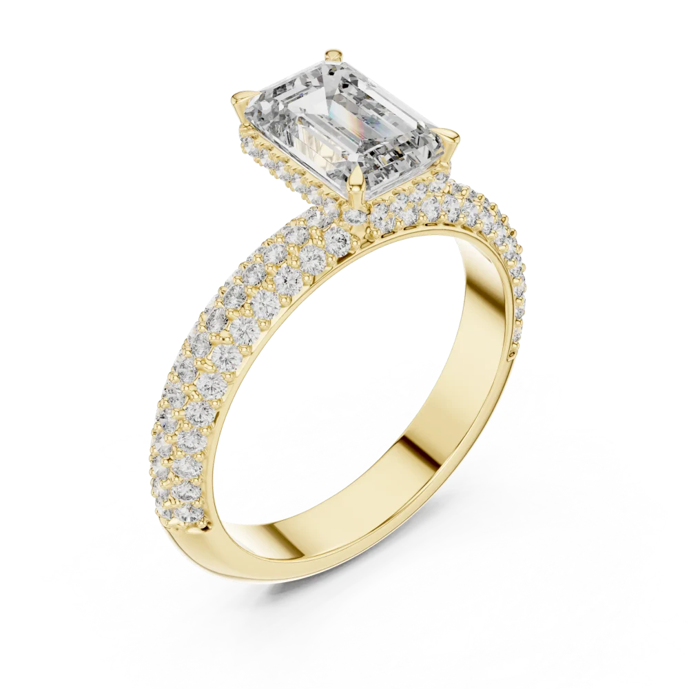 Discover the radiant brilliance of this Emerald Cut Solitaire Ring. Featuring pavé-set DIAMEUR diamonds, it is the ultimate symbol of modern luxury.