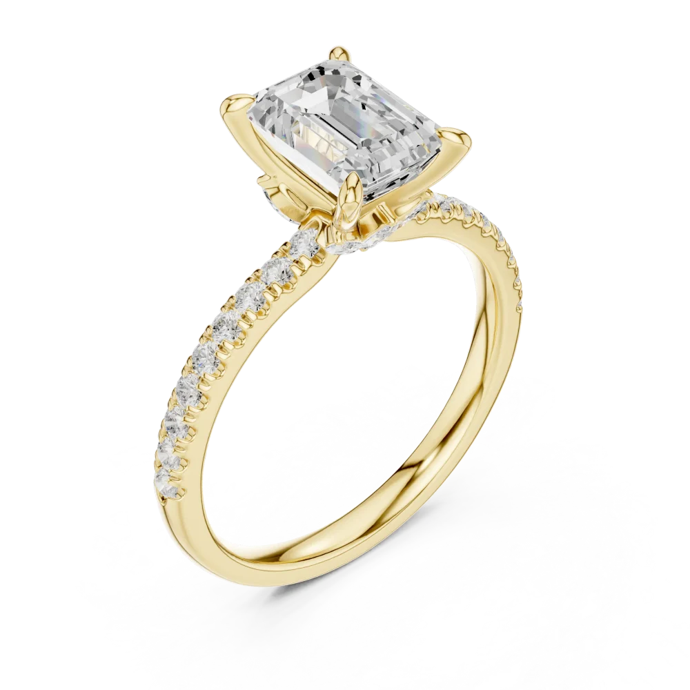 Discover the radiant beauty of this emerald-cut solitaire ring, featuring exquisite pavé-set accents. Shop this modern classic and define your style.